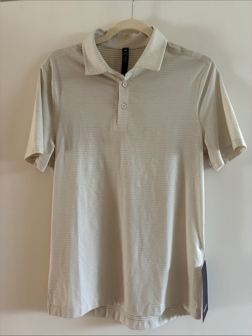 lululemon athletica Men’s Evolution Polo size S
Light Beige Striped Polo